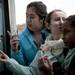 Ava Sherick (center) checks the Community High School lottery list for her friend's name on Tuesday, Feb. 12. Daniel Brenner I AnnArbor.com